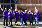 All staff outside in PA Tshirts